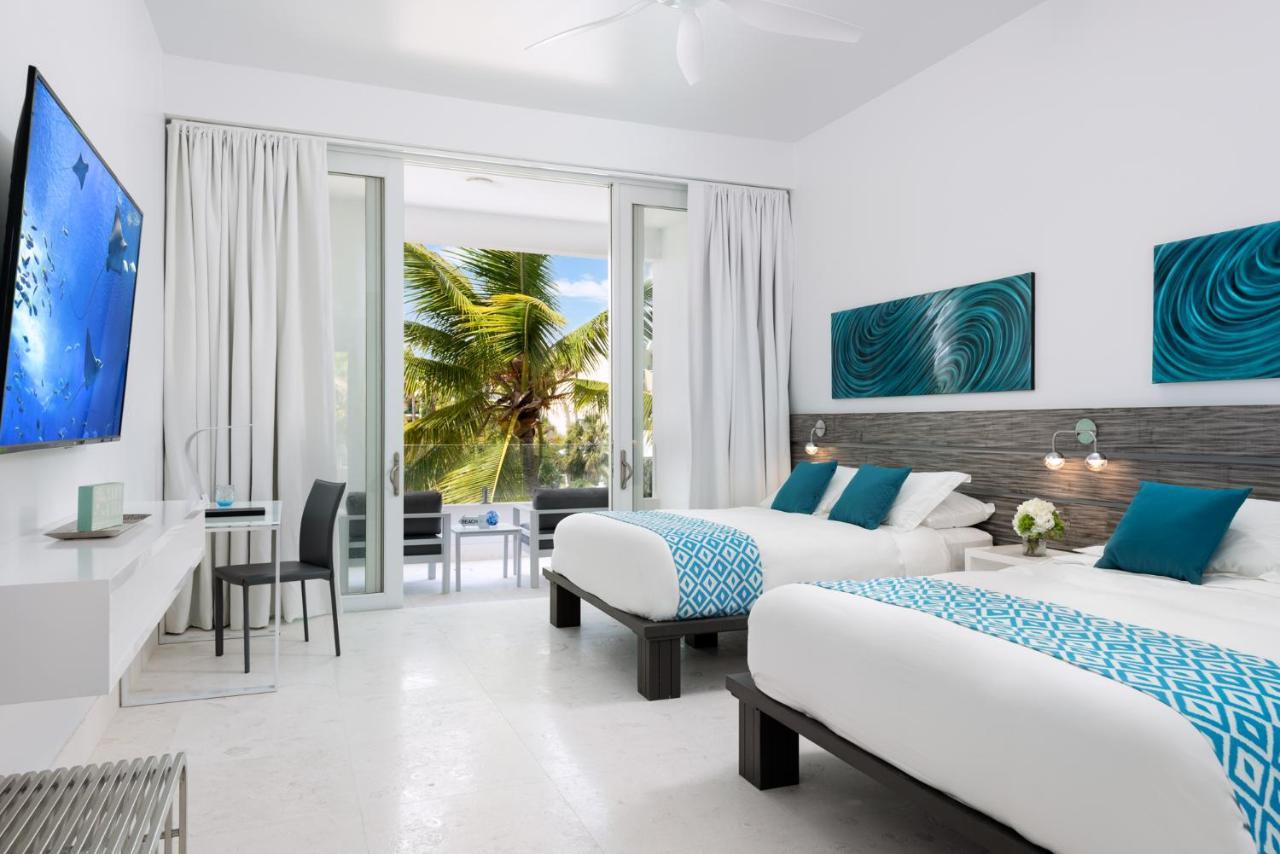 Zenza Boutique Hotel Turtle Cove Экстерьер фото